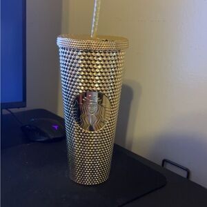 Venti gold studded Starbucks cup